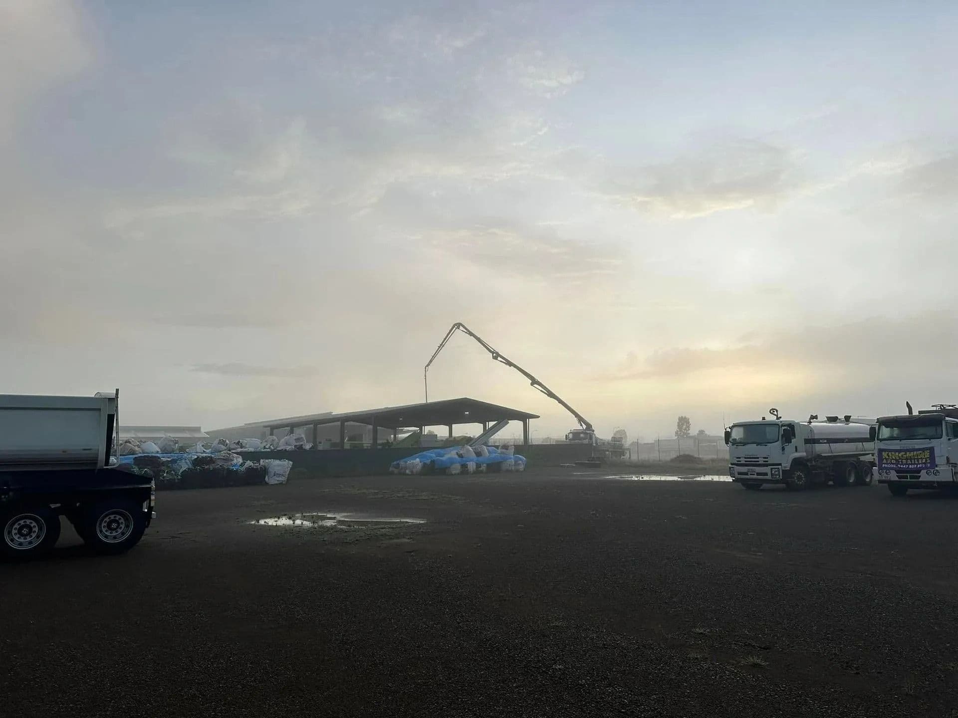 Construction Site With Concrete Pump Pouring Concrete — Far Northern Concrete Pumping in Tablelands, QLD