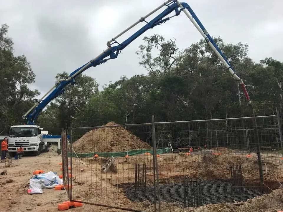 Concrete boom pump set up on site