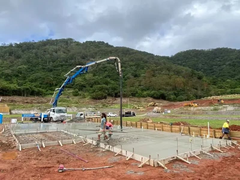 Concrete Being Poured at a Construction Site With a Pump Truck — Far Northern Concrete Pumping in Mareeba, QLD