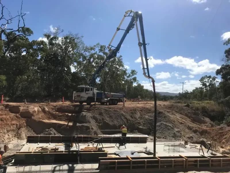 Concrete Pump Truck Pouring Concrete — Far Northern Concrete Pumping in Mareeba, QLD